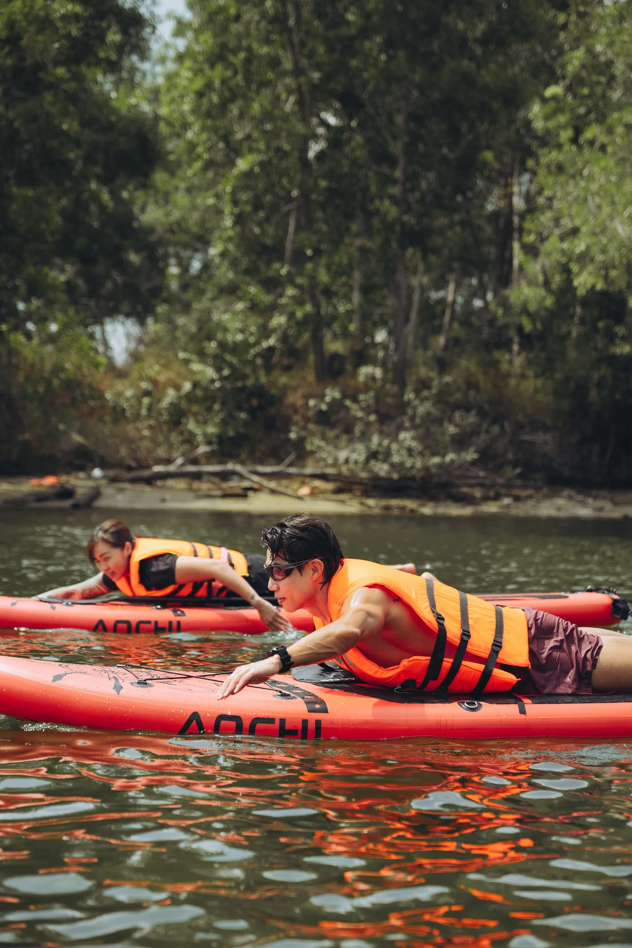 Two paddlers on a calm bay